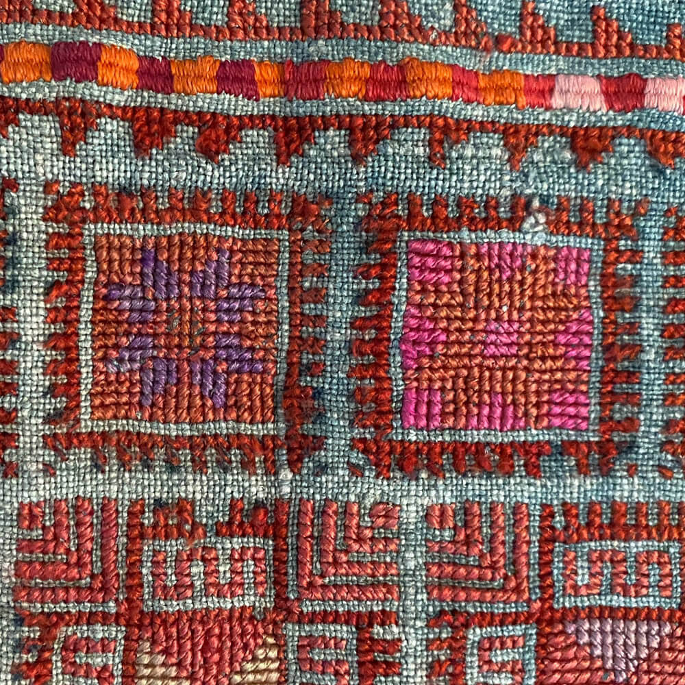 A close up of a piece of Tatreez needlework.