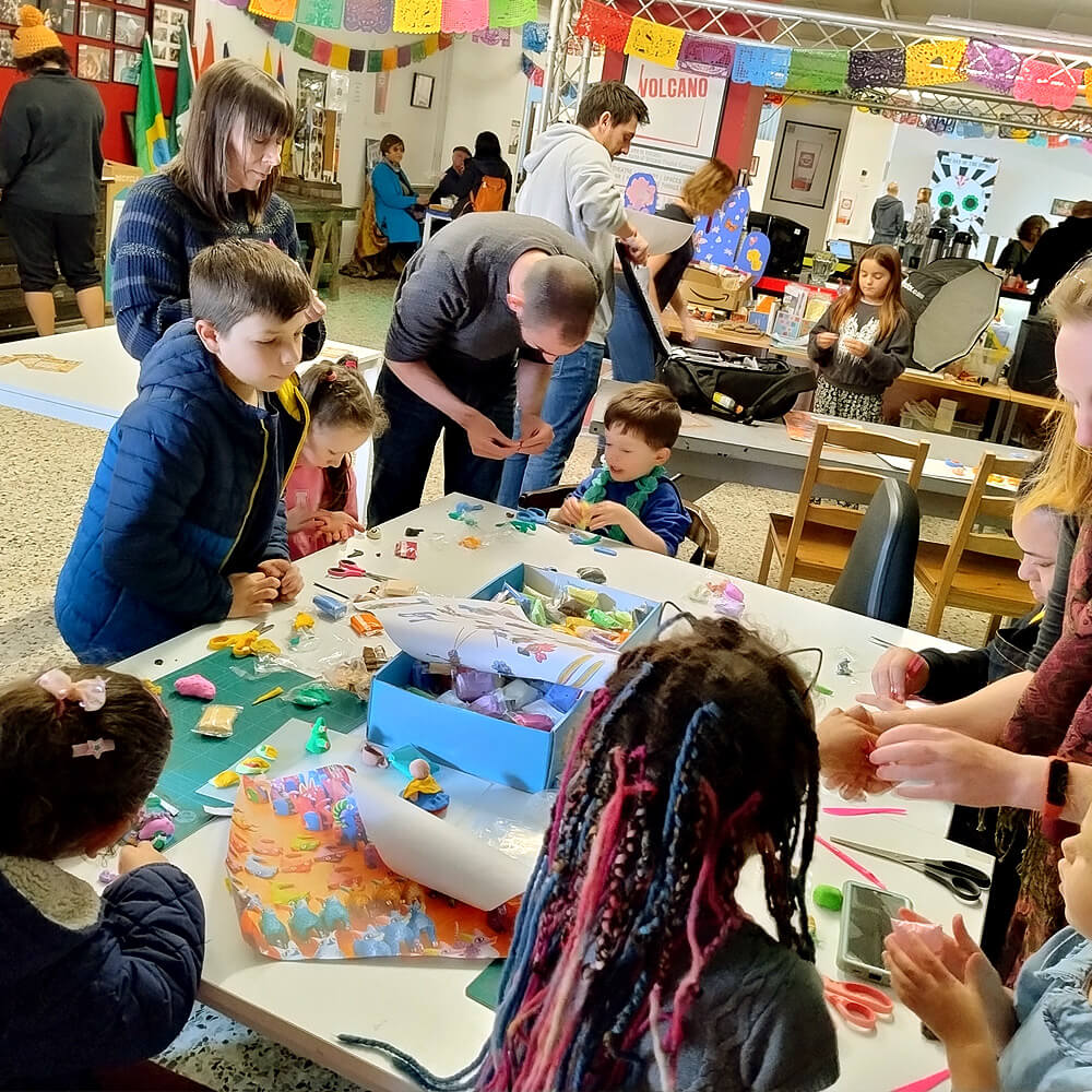 Family groups doing crafts at Volcano